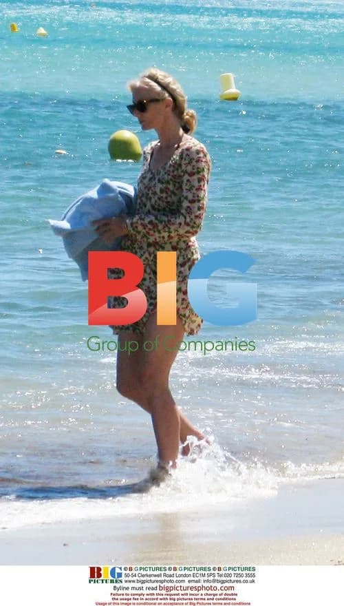 Joely Richardson comforted by daughter Daisy on beach