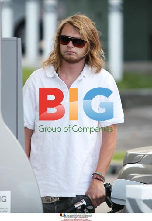 Guy-Manuel De Homem-Christo of Daft Punk Pumping Gas