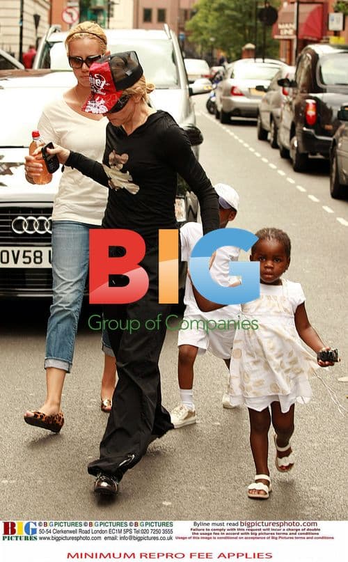 Madonna with adopted kids in London