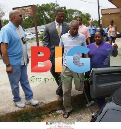 Dr. Armstrong exits clinic after DEA raid