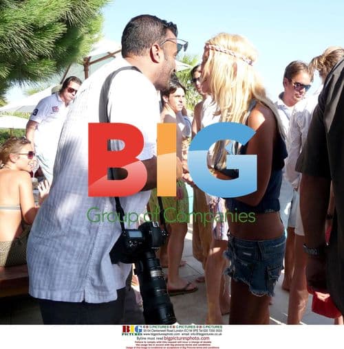 Tara Reid mingles at Nikki Beach in St. Tropez