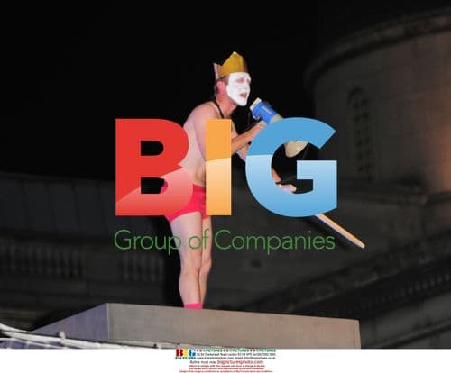 Performer strips for speech on Trafalgar Square