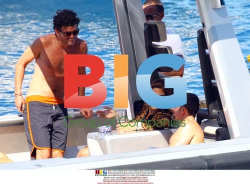 Eva Mendes and George Gargurevich on boat in Italy