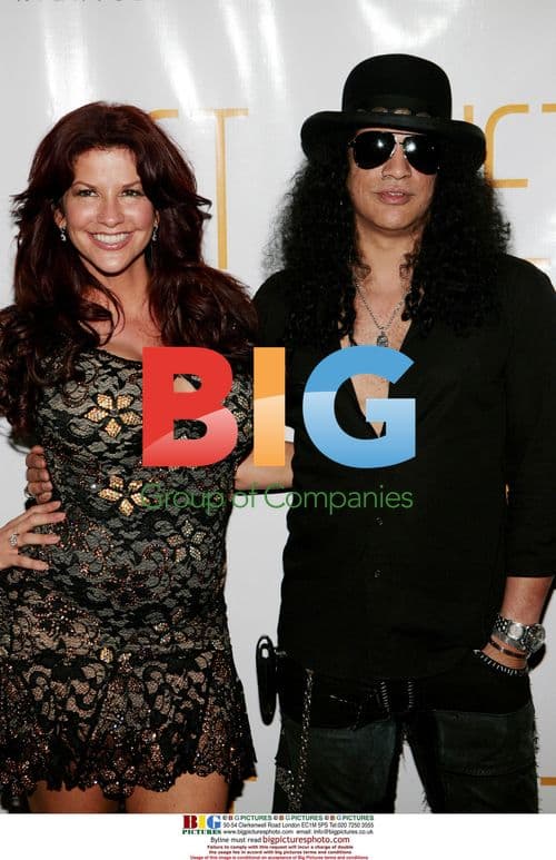 Slash and Perla Hudson arrive at Slash's birthday party