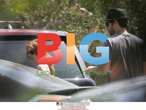 Sacha Baron Cohen and Isla Fisher visit Courteney Cox