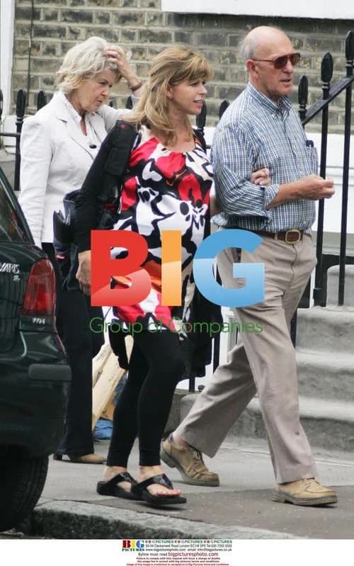 Pregnant Kate Garraway walks home in London