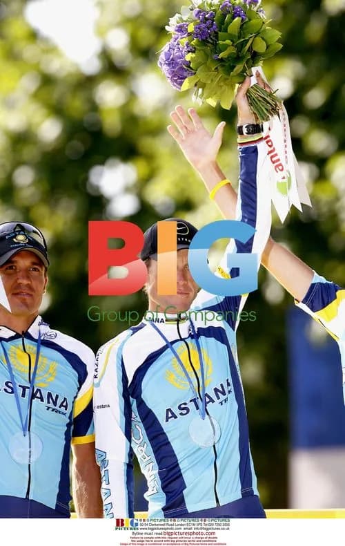 Armstrong and Contador on Tour de France podium