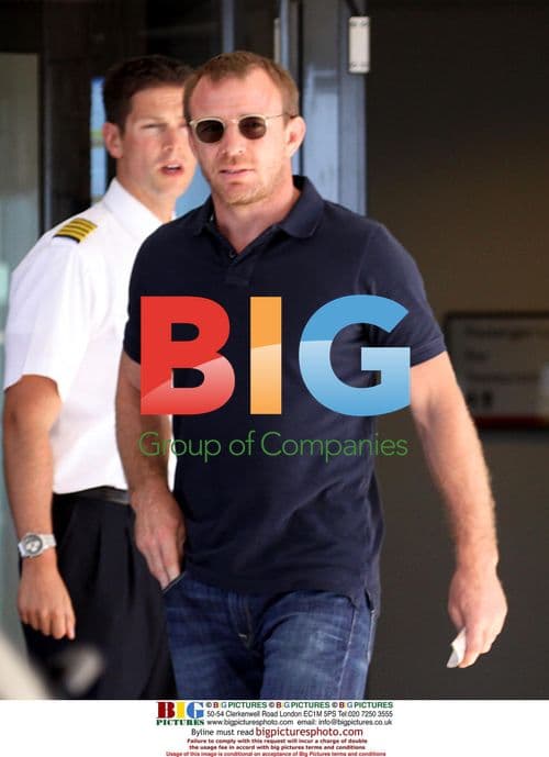 Guy Ritchie Relaxes with Twins