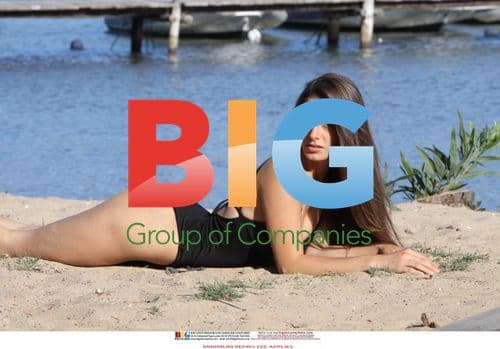 Model twins Katarina and Kristina pose on beach