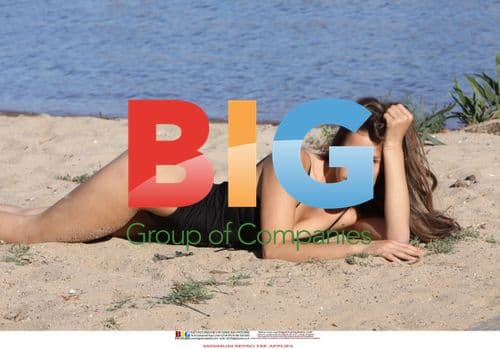 Model Twins Posing Sexily on Beach