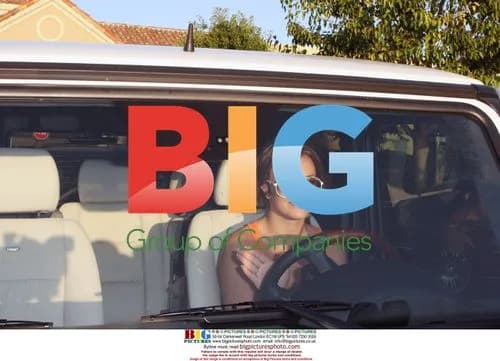 Britney Spears Waves From SUV