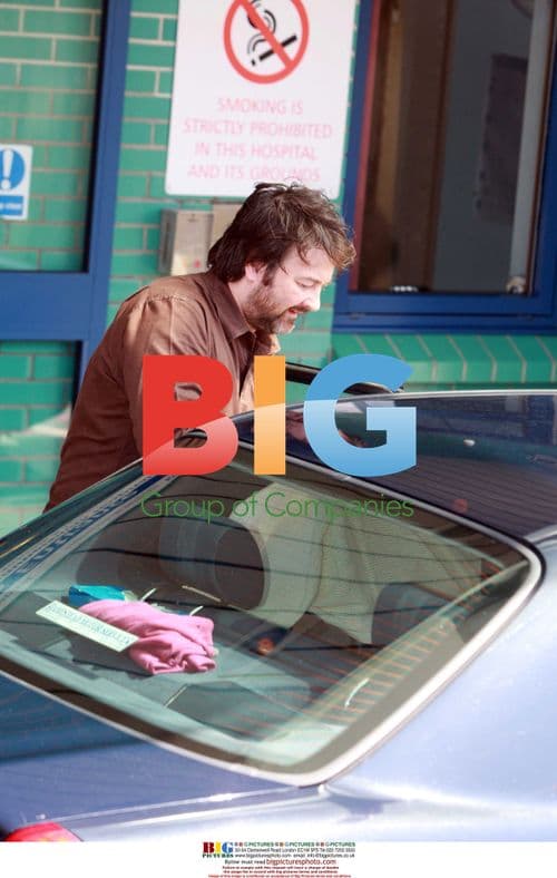 GMTV presenter Kate Garraway leaves hospital with family