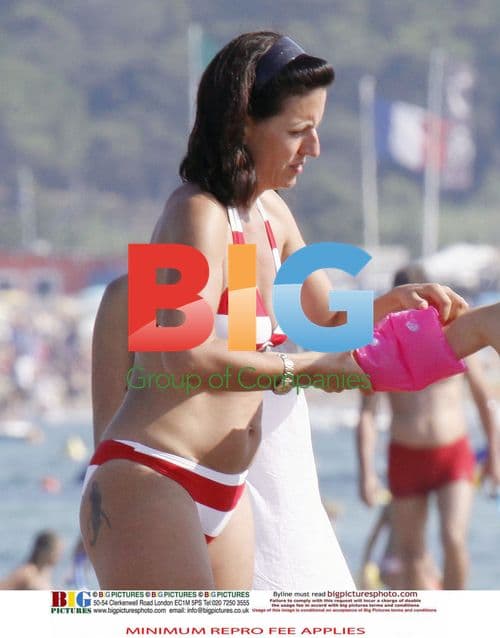 Davina McCall and family on beach in France