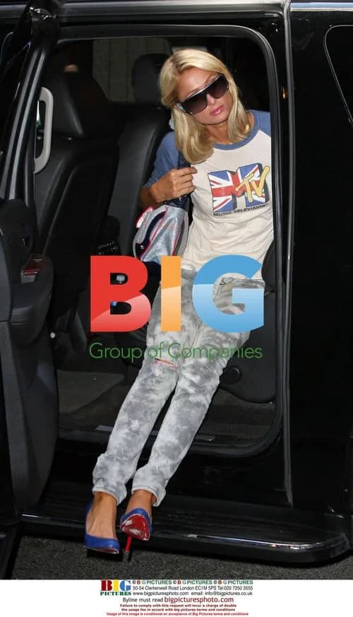 Paris Hilton Poses for Photographers