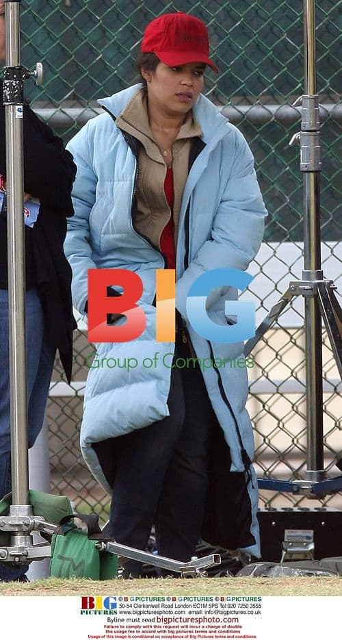 America Ferrera and Carlos Mencia on set