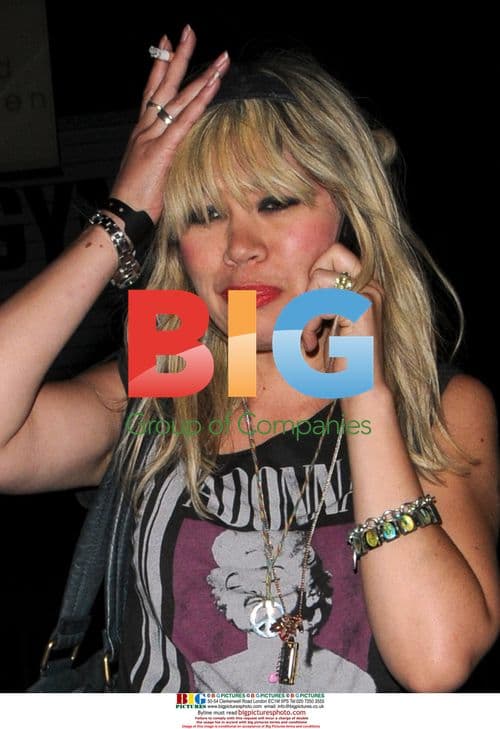 Mystery woman with Jack Tweed leaves hotel