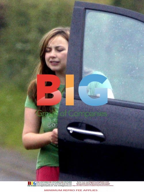 Charlotte Church sports casual look in rain