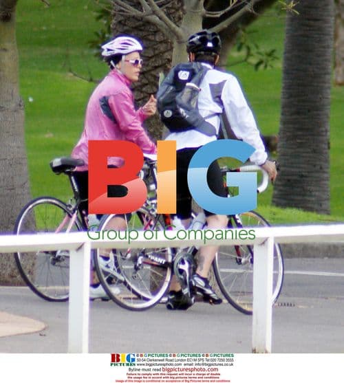 Singer Pink and husband bike riding in Sydney