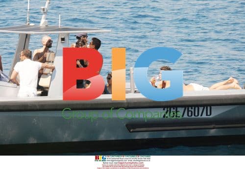 Stefano Gabbana relaxes on a boat with friends