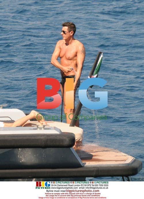 Stefano Gabbana relaxes on boat with friends