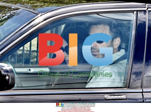 David Carradine's wife leaving home with police