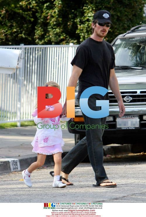 Christian Bale and daughter visit neighbor