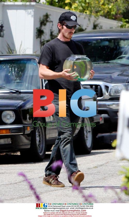 Christian Bale and daughter visit neighbor