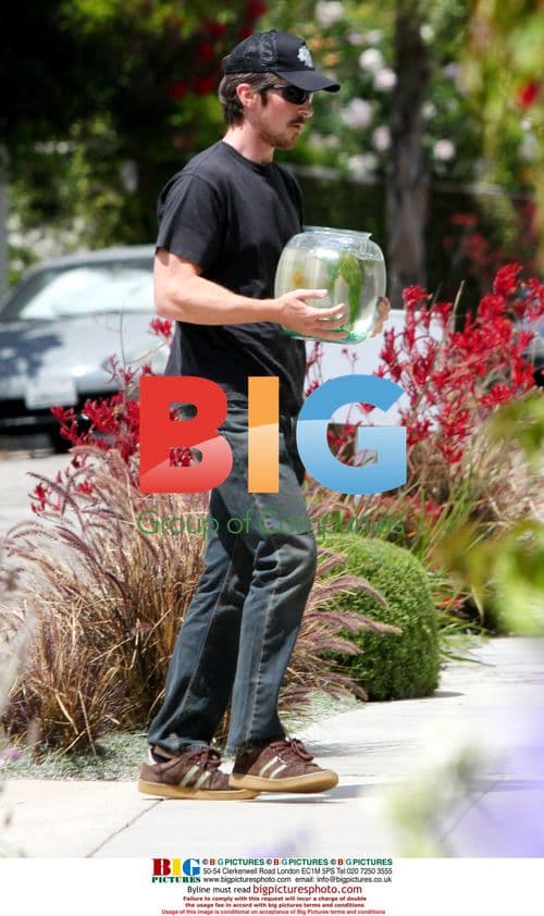 Christian Bale and daughter visit neighbor