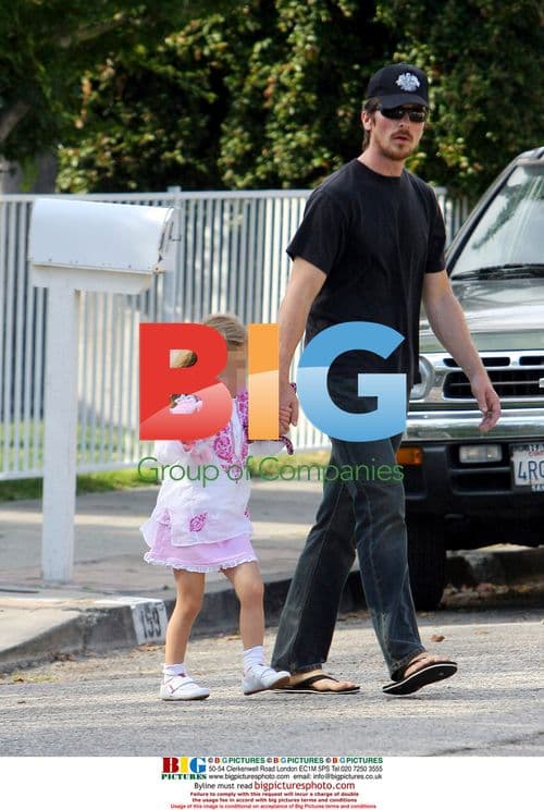 Christian Bale and daughter visit neighbor