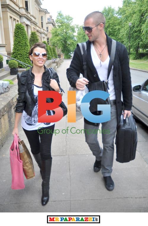Dannii Minogue and boyfriend leave hotel