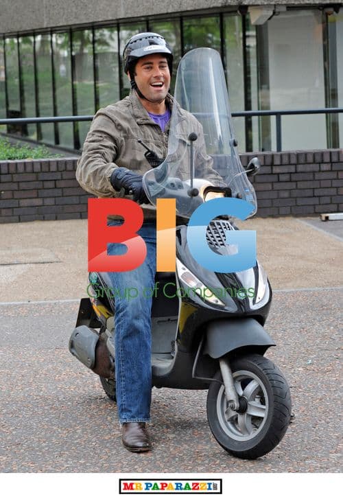 Giles Vickers Jones on motorcycle outside GMTV