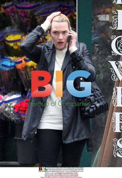 Kate Winslet on Cell Phone in the Rain
