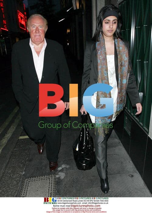 Andrew Neil arrives at the Ivy