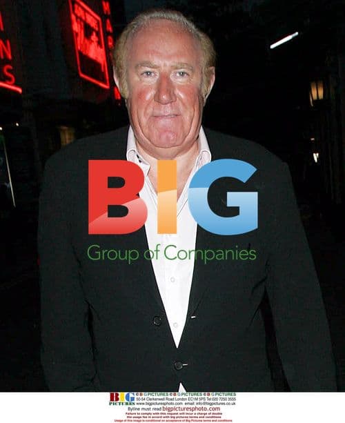 Andrew Neil arrives at The Ivy with friend