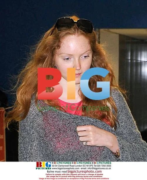Lily Cole looking frumpy at airport