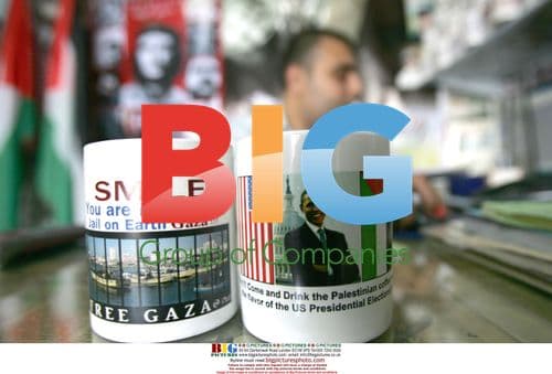 Palestinian shop owner displays Obama mugs in Gaza