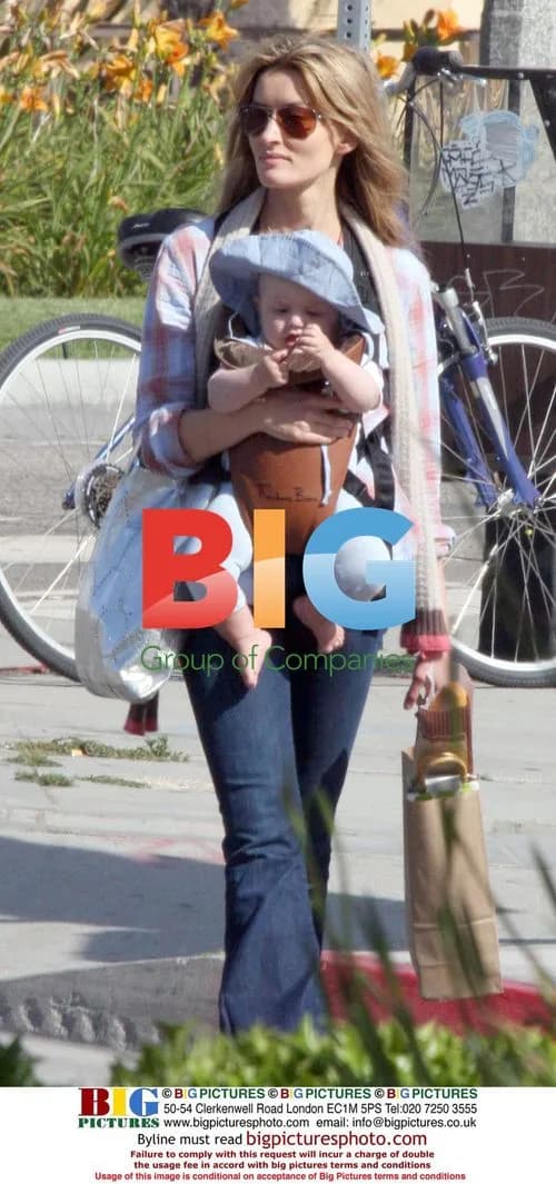 Natasha Mcelhone shopping with baby