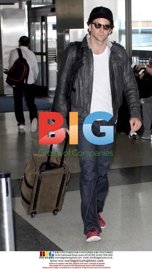 Bradley Cooper Takes Out Garbage at LAX
