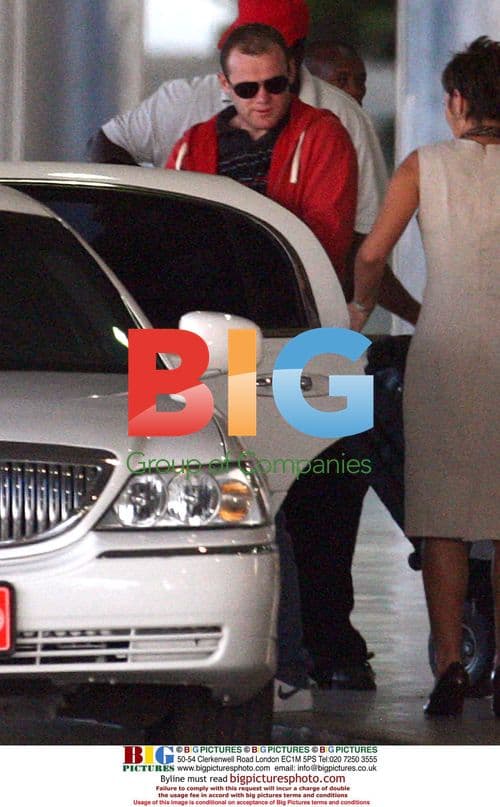 Wayne Rooney and Coleen arrive in Barbados