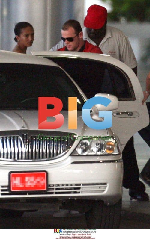 Wayne Rooney and Coleen Arrive in Barbados