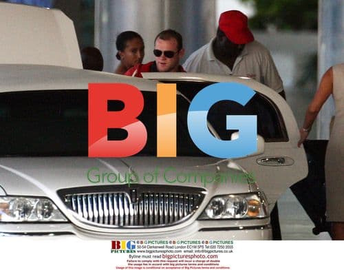 Wayne Rooney and Coleen arrive in Barbados