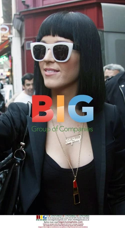 Katy Perry Leaves Paris Hotel with Father