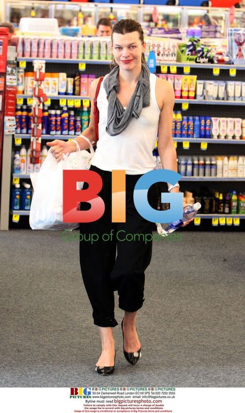 Mila Jovovich goes shopping in Beverly Hills