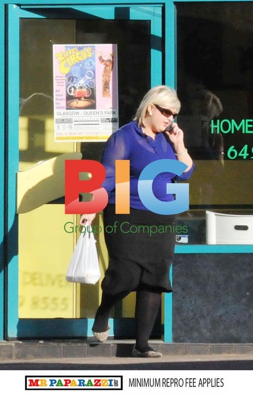 Michelle McManus loading Tesco bags
