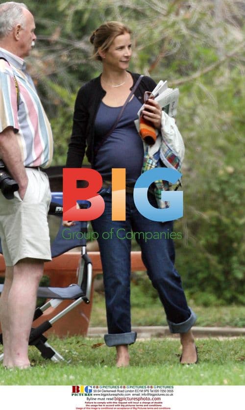 Pregnant Rachel Griffiths with family at park