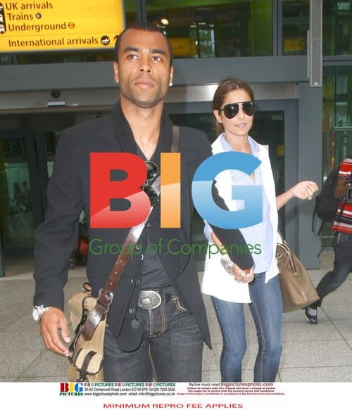 Ashley and Cheryl Cole arrive in UK
