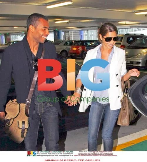 Ashley and Cheryl Cole return from France