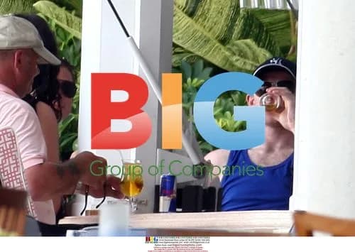 Coleen Rooney relaxes in Caribbean