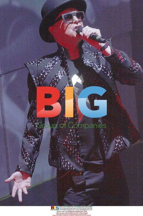 Neil Tennant of Pet Shop Boys performs