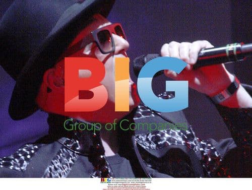 Neil Tennant of Pet Shop Boys Performs